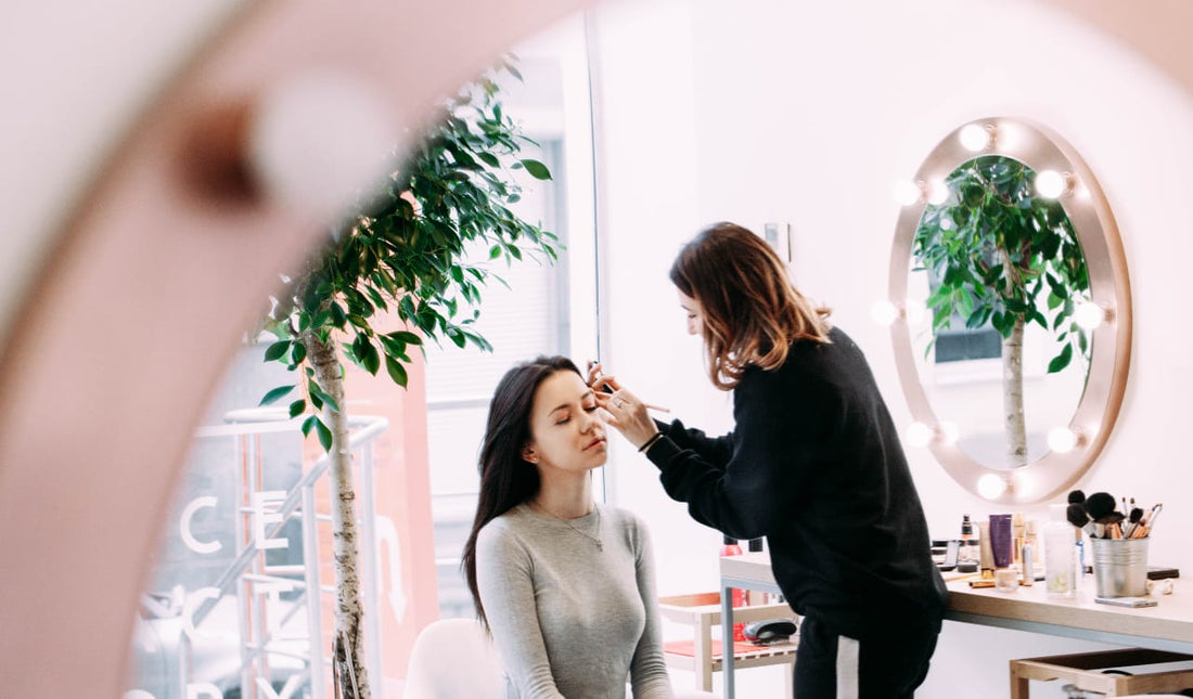 Beauty college students in a professional training environment — cosmetology school programs at Bela Beauty College